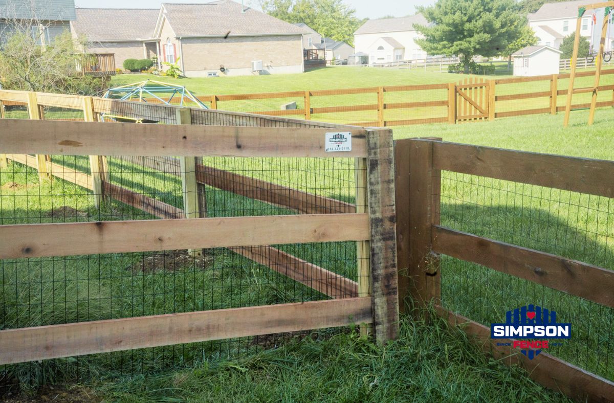 Kentucky Board Fence Installation in Middletown, Ohio 5 Fresh Kentucky Board fence installation with black welded wire, built to match the existing fence and reflect a popular neighborhood fencing style.