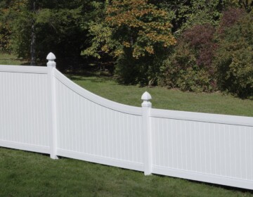 White Swoop Bufftech Vinyl Fence with Gothic Post Tops White Swoop Bufftech Vinyl Fence with Gothic Post Tops